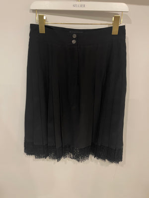 Chanel Cruise 2005 Black Silk Pleated Mini Skirt with Lace Trim and CC Buttons Size FR 38 ( UK 10)