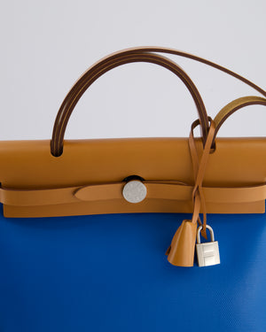 *HOT & RARE* Hermès Herbag 31 in Bleu Zanzibar Berlin Coated Canvas, Natural Vache Hunter Leather and Ecrù Toile H Canvas with Palladium Hardware