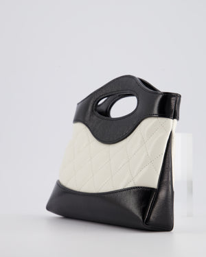 Chanel Mini 31 Clutch Bag with Chain in Black and White Shiny Calfskin Leather with Champagne Gold Hardware