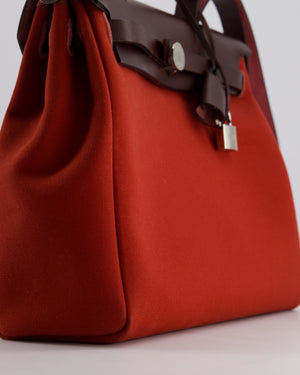 Hermès Herbag Zip Retourne Verso 31 Bag in Cuivre and Mécano Toile Officier Canvas, Rouge Sellier Vache Hunter Leather with Palladium Hardware